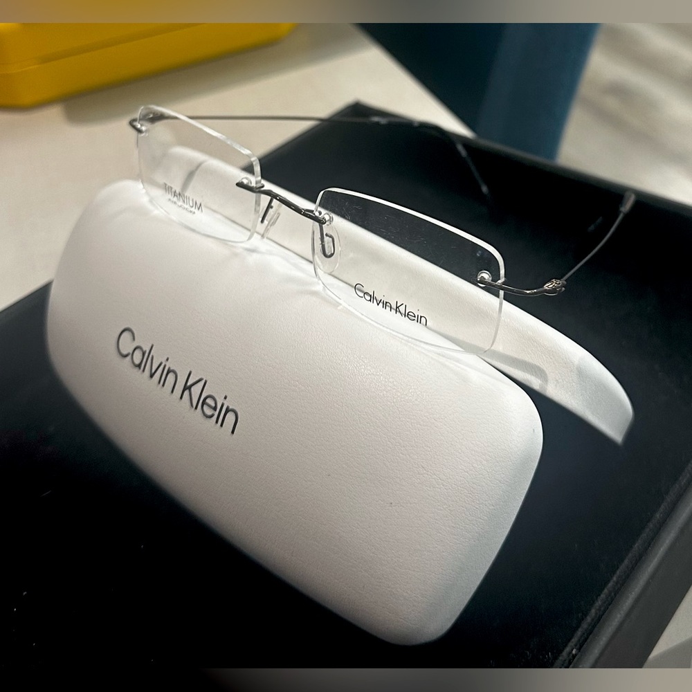 Calvin Klein airlock unisex titanium drill mount frame
